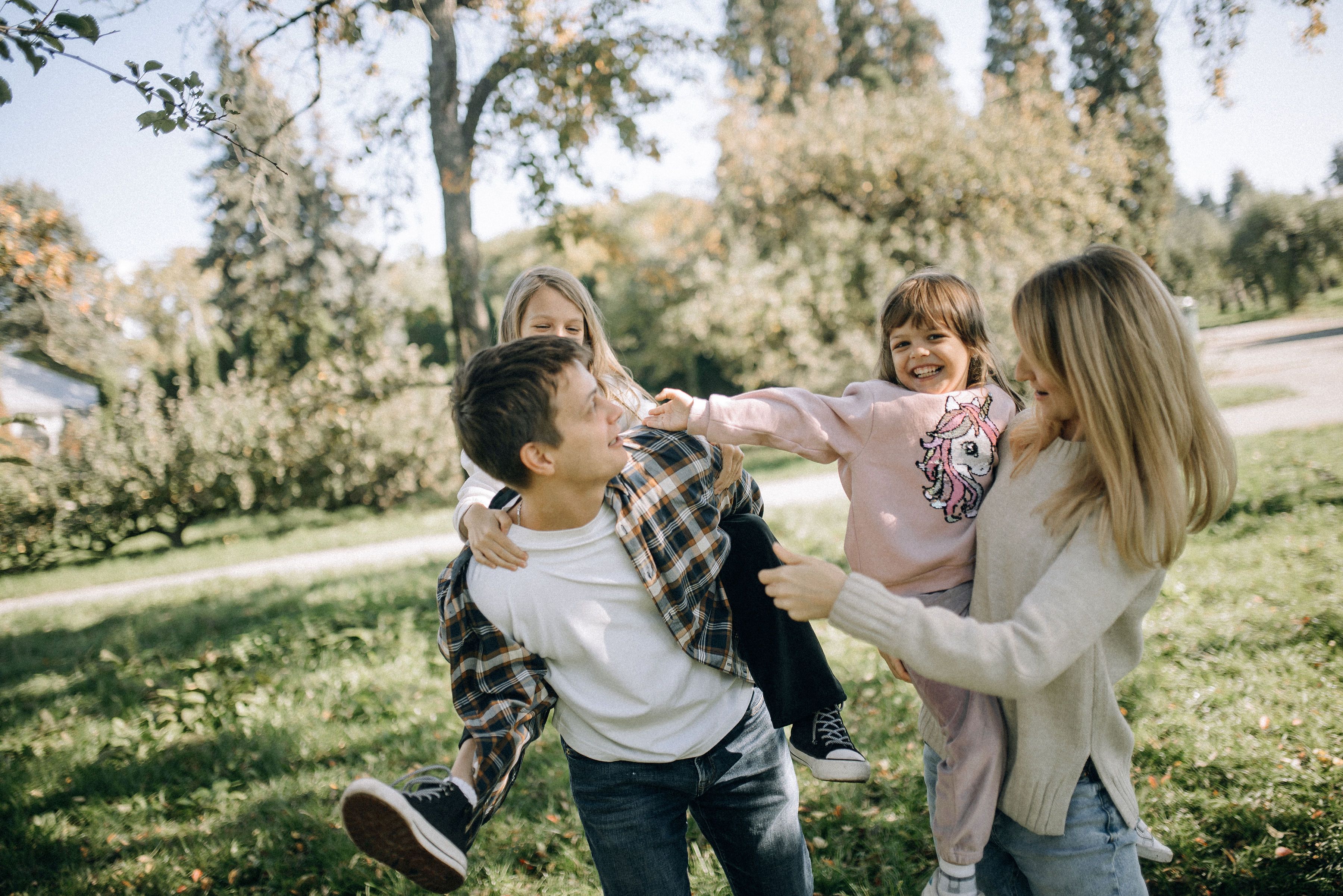 An image of a family smiling